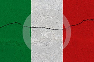 Italy flag on concrete wall with crack