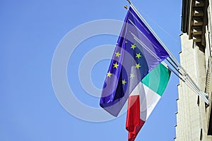 Italy flag and Europe flag waving together