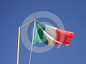Italy Flag - Italian Flag waving on Blue Sky