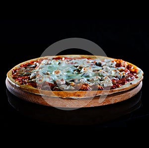 Italy hot pizza with chiken, tomatoo and cheese isolated on black background