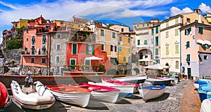 Italy, Liguria. Scenic colorful traditional village Tellaro with old fishing boats.