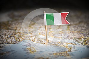 Italy marked with a flag on the map