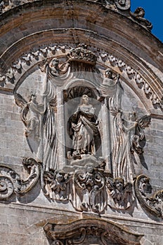 Italy. Matera. Church of San Francesco d` Assisi, 13th - 18th centuries. Baroque facade. Niche with the Immaculate between angels