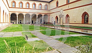Italy, Milan: Patio`s in Sforza Castle with feral cat