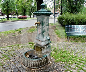 Italy, Milan, piazza Francesco Durante, an ancient hand pump photo