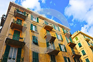 Savona Green-Iron Balconies and Yellow Building, Picturesque Neighborhood, Travel Italy