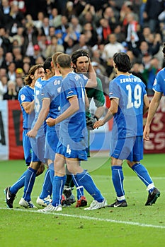 Italy players celebrate Gianluigi Buffon for the penalty saved