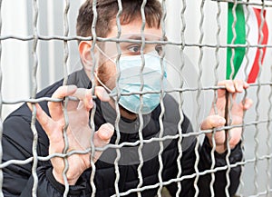 Italy quarantine, stop. Italy spreading outbreak. Novel in Europe EU. Man in medical photo