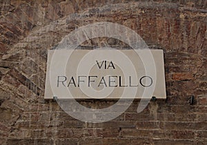 Italy: Road signal Raffaello Street. photo