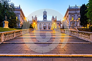 Italy Rome Capitoline hill city square museum buildings and statue illuminated at sunrise