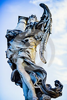 Italy, Rome, Castel Sant`Angelo, statue of an angel with a colum photo