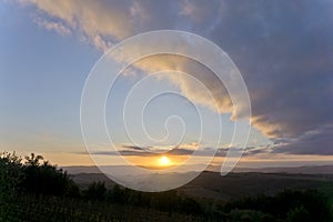 Italy, Tuscany, countryside panorama near Pienza, Siena at the sunset photo