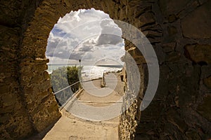 Italy Tuscany Maremma Castiglione della Pescaia, panoramic view  from medieval arch stone