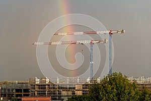 Italy Tuscany Pisa, Cisanello hospital under construction, construction site crane with rainbow