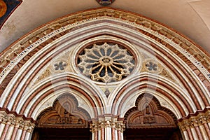 Italy, Umbria, Assisi: Archs of facade of saint Francesco church.