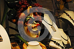 Italy- Venice- A Carnival Mask and Jewelry in a Shop Window photo