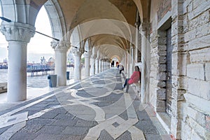 Italy, Venice. Colonnade of the Doge`s Palace in Venice