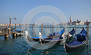 Italy, Venice, gondolas moored along Riva degli Schiavoni