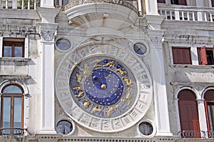 Italy. Venice. St Mark's tower with lion and clock photo