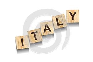 Italy, word on wooden blocks. Isolated on a white background