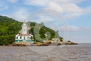 Itapua lighthouse in Guaiba lake photo