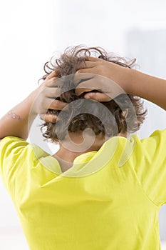 Itchy Scalp from Head Lice back view