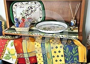 Items  and fabrics traditional Provencal on a cupboard