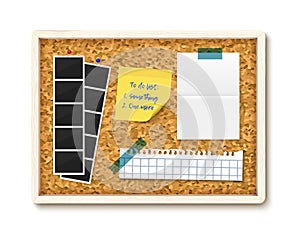 Items pinned to corkboard with wood frame