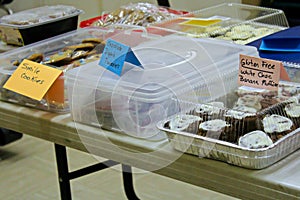 Items set up on a table at a bake sale