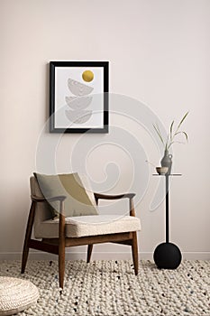 Iterior design of elegant apartment with poster, armchair with mock up poster frame pillow, beige wall, coffee table and personal