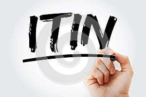 ITIN - Individual Taxpayer Identification Number acronym with marker, concept background photo
