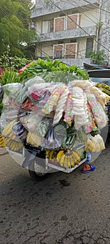 itinerant greengrocer brings with it a motorbike, practical, creative.