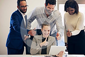 Its all good with us. Shot of a group of businesspeople showing thumbs up during a video call on a digital tablet in an