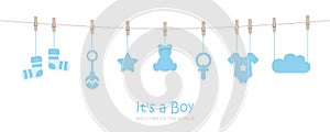 Its a boy welcome greeting card for childbirth with hanging baby utensils