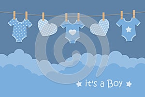 Its a boy welcome greeting card for childbirth with hanging hearts and bodysuits