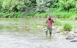 Its Engaging for Life. mature man fly fishing. man catching fish. fisherman show fishing technique use rod. hobby and