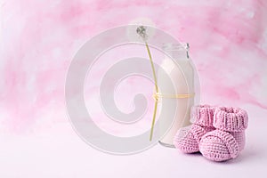 Its a girl pink theme baby shower or sip and see party background with decorative elements - booties and milk bottle