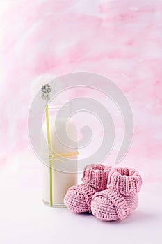 Its a girl pink theme baby shower or sip and see party background with decorative elements - booties and milk bottle