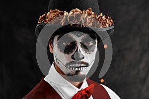 Its a Mexican tradition. Cropped portrait of a handsome young man dressed in his Mexican-style halloween costume.