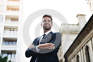 Its the start of a bright business day. Shot of a handsome young businessman on his morning commute to work.