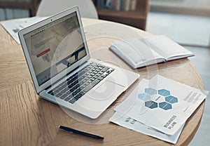 Its vital to always have a plan. Still life shot of a laptop and paperwork on a table in an office.