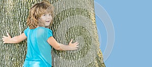Its so wide. Boy child try to climb tree. Childhood and boyhood. Boyhood days. Tree climbing. Horizontal poster design