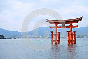 Itsukushima Jinja Otorii or Grand Torii Gate on the sea of Miyajima, Japan. photo