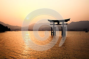 Itsukushima Torii Gate in Miyajima, Japan photo