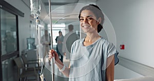 Iv drip, patient and portrait of happy woman in a hospital or clinic corridor with treatment for recovery from surgery