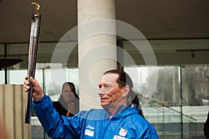 Ivan Patzaichin with the olympic torch