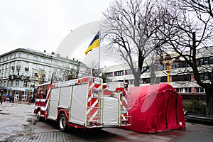 Ivano-Frankivsk, Ukraine - March, 2023: Point of invincibility. Red tent with fire rescue car in the city center