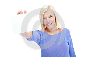 Ive been saving this for you. A beautiful young woman holding a blank card while isolated on a white background.