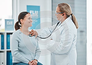 Ive been taking better care of myself, doctor. a doctor examining a patient with a stethoscope during a consultation in