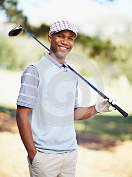 Ive been waiting all week to get on the course. Portrait of a confident african american golf player holding a driver.